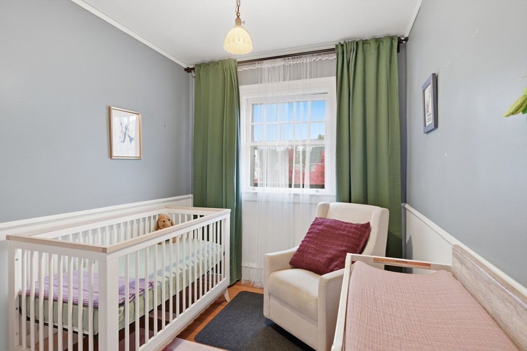 27 Lexington Avenue Holyoke, MA 01040 - Photo 24 of 42 a bedroom with furniture and a window