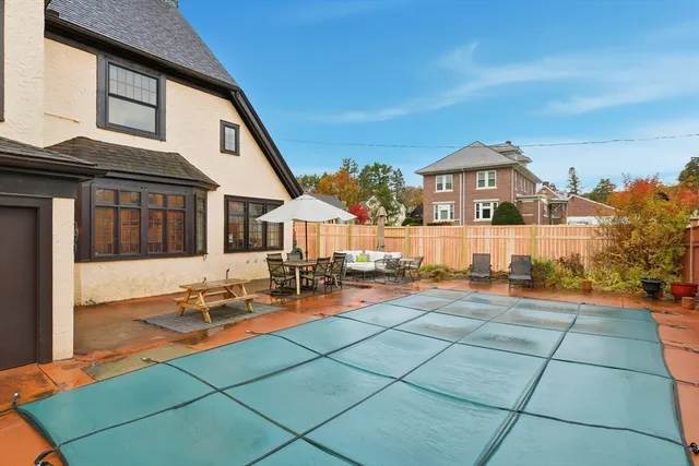 a front view of a house with patio