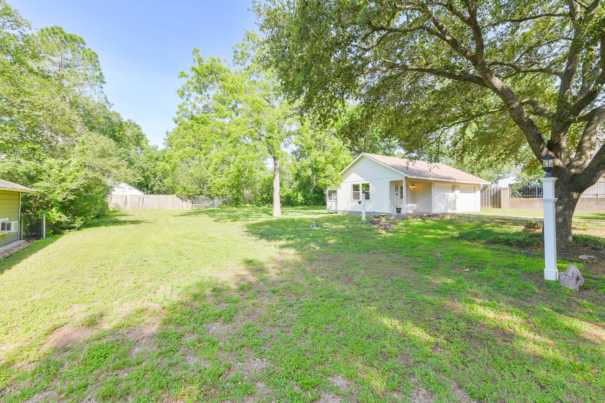 802 South Day Street Brenham, TX 77833 - Photo 11 of 50 a house view with a garden space