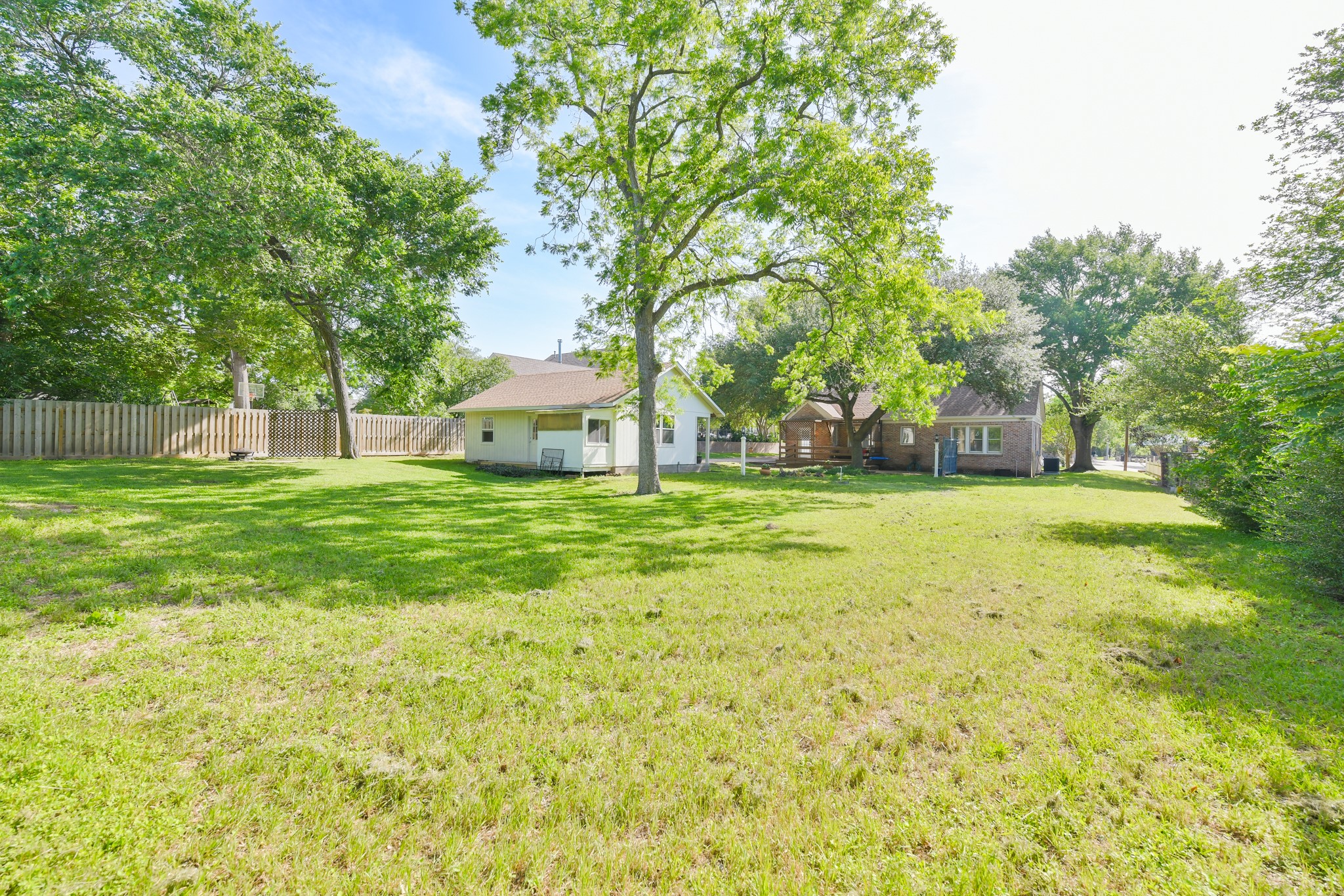 802 South Day Street Brenham, TX 77833 - Photo 12 of 50 a view of a house with a big yard