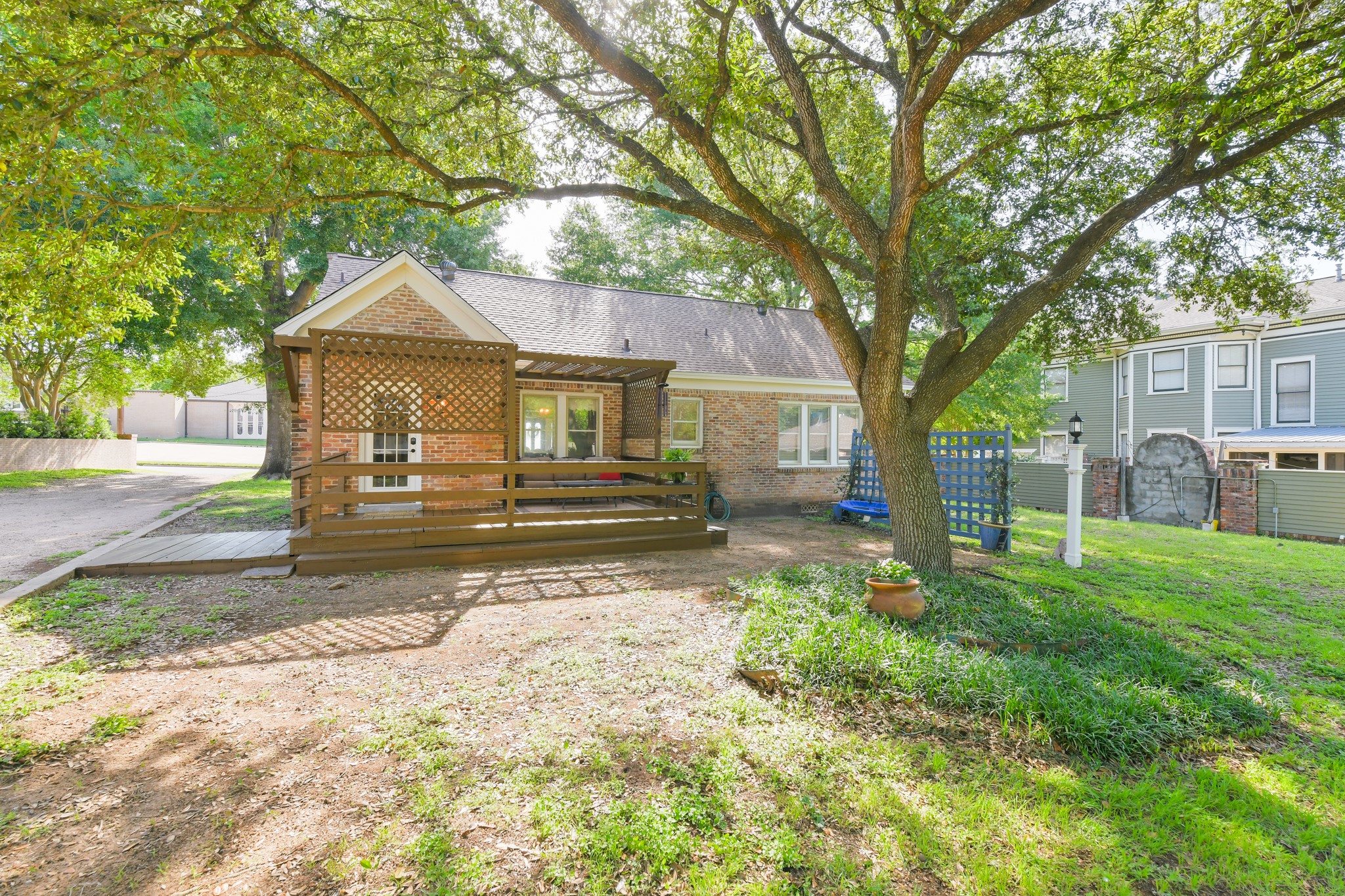 802 South Day Street Brenham, TX 77833 - Photo 13 of 50 a front view of a house with a yard