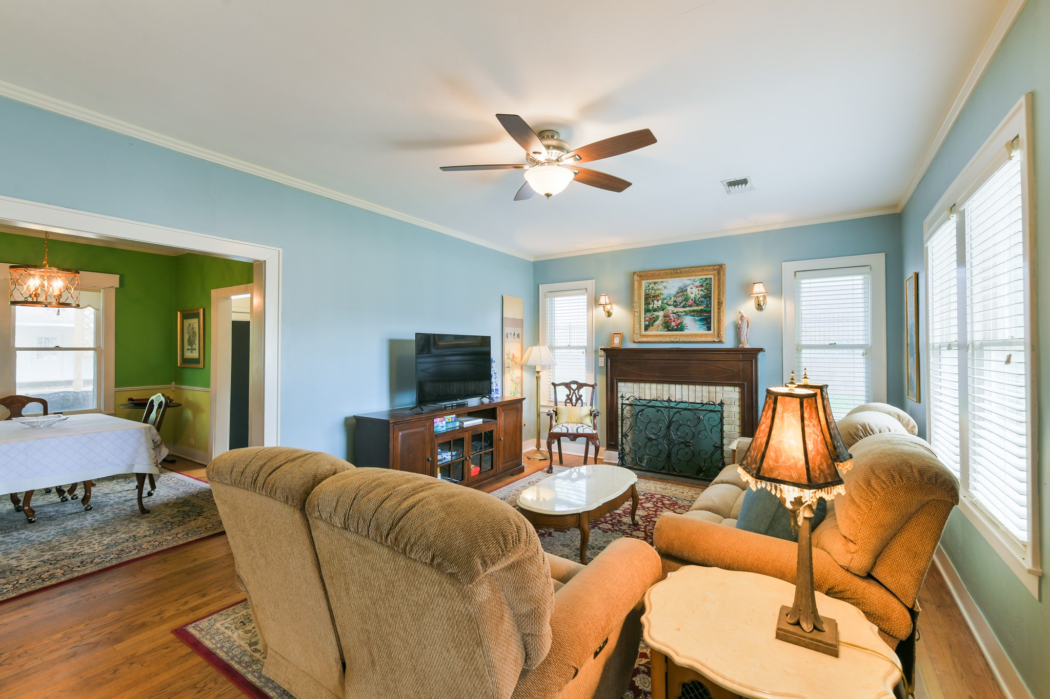 802 South Day Street Brenham, TX 77833 - Photo 18 of 50 a living room with furniture and a flat screen tv