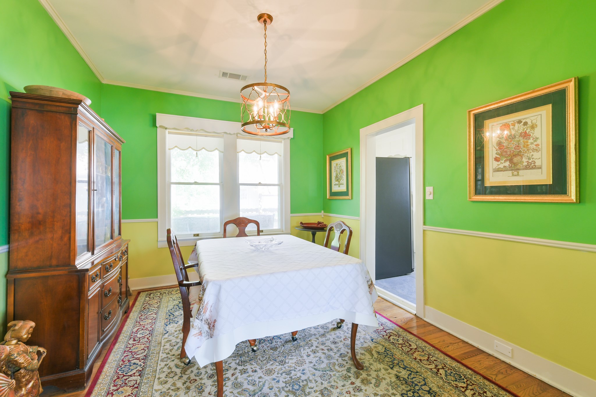 802 South Day Street Brenham, TX 77833 - Photo 23 of 50 a view of a dining room with furniture window and wooden floor