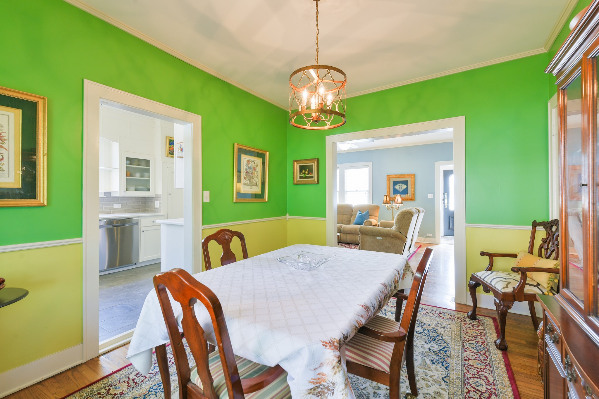 802 South Day Street Brenham, TX 77833 - Photo 24 of 50 a view of a dining room with furniture and a chandelier