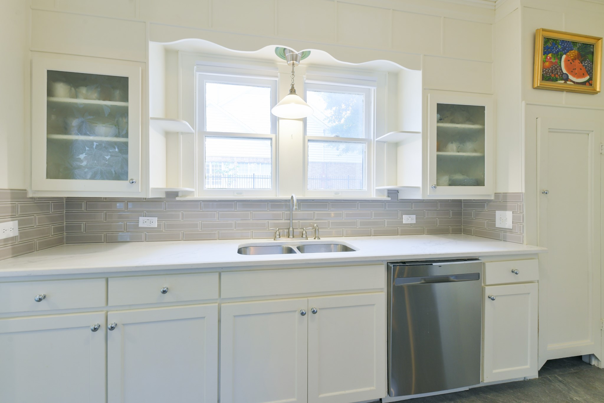 802 South Day Street Brenham, TX 77833 - Photo 29 of 50 a kitchen with a sink and cabinets