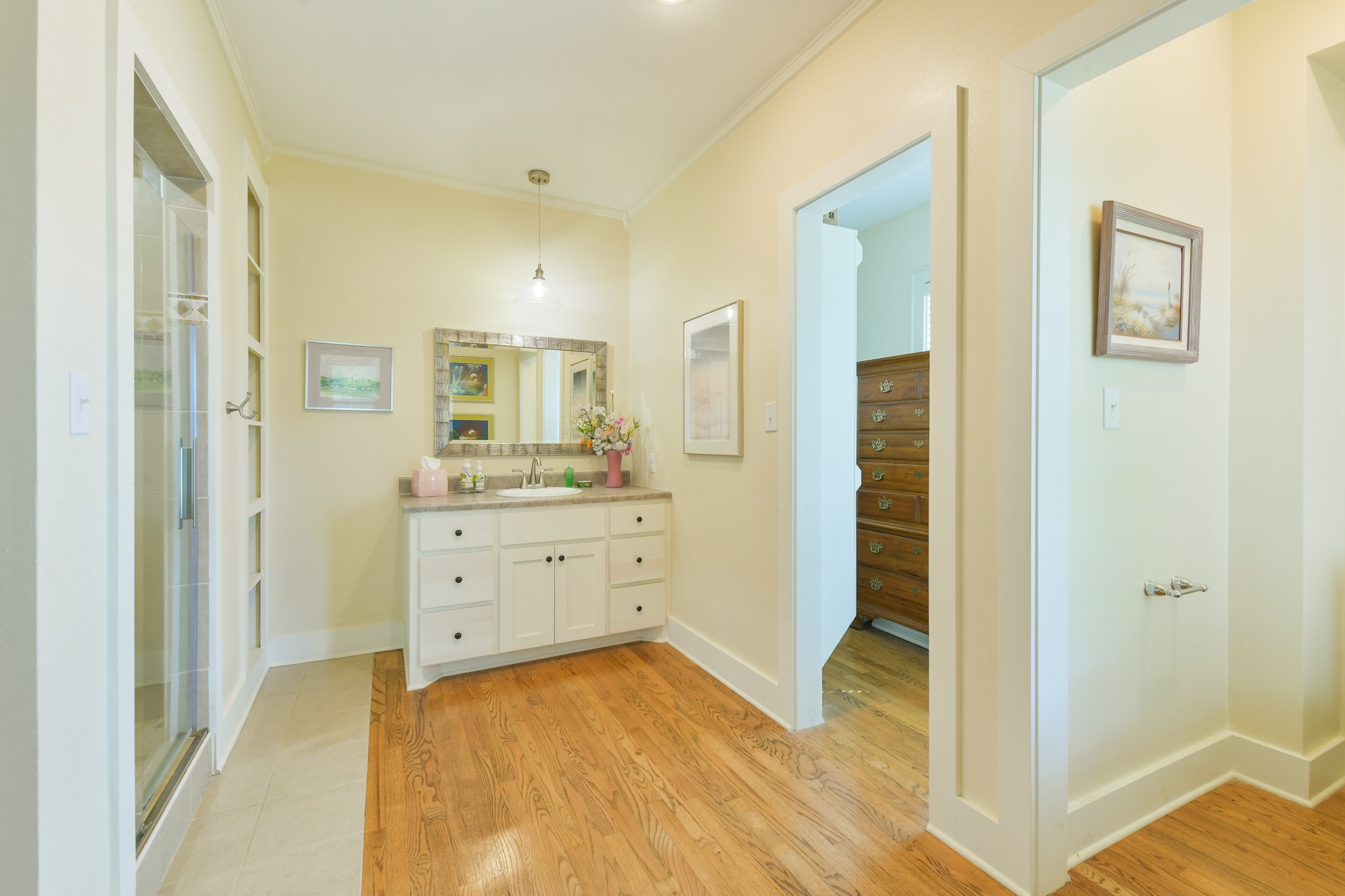 802 South Day Street Brenham, TX 77833 - Photo 38 of 50 a bathroom with a sink and a mirror