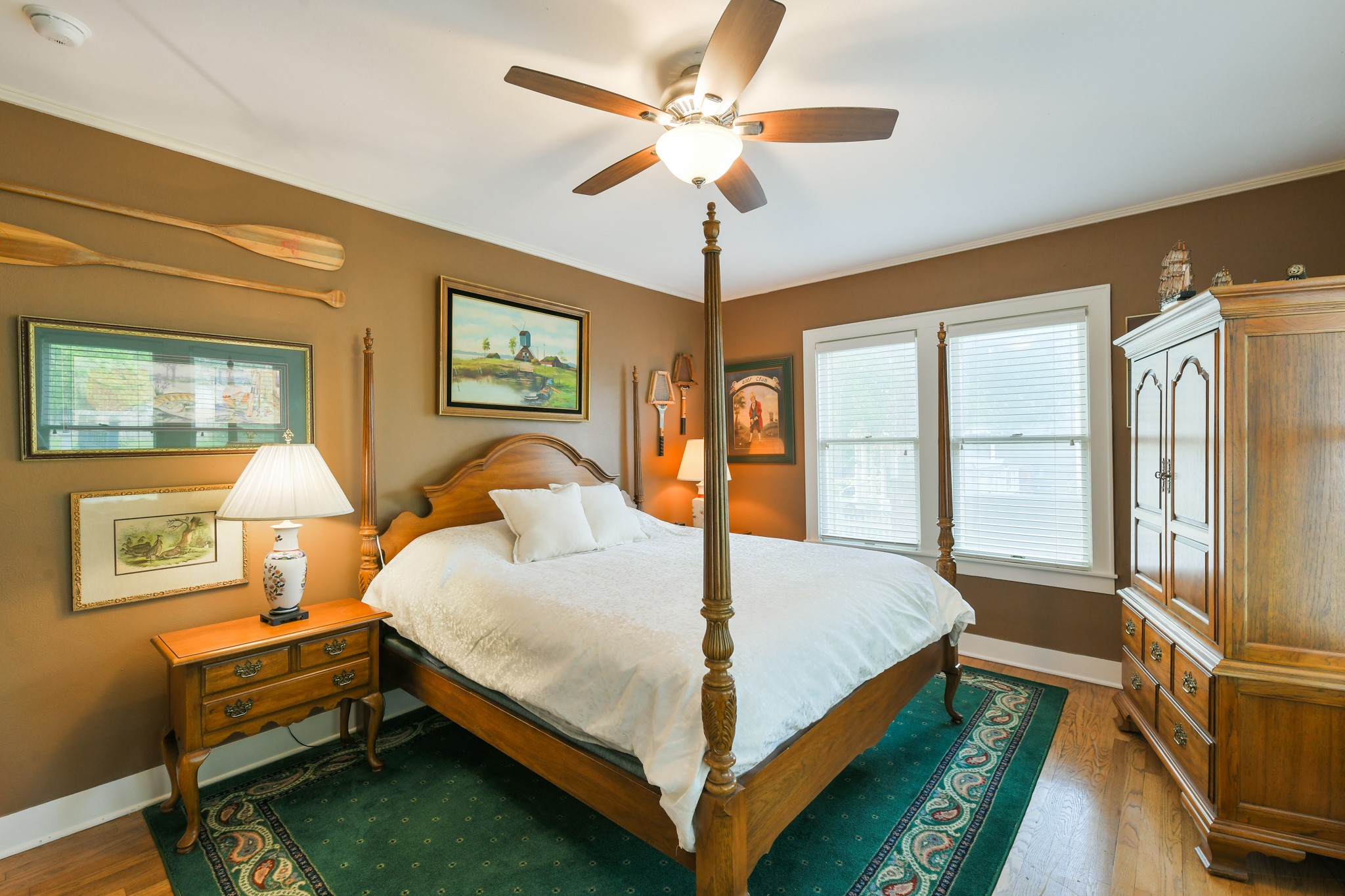 802 South Day Street Brenham, TX 77833 - Photo 43 of 50 a bed room with a bed and a chandelier