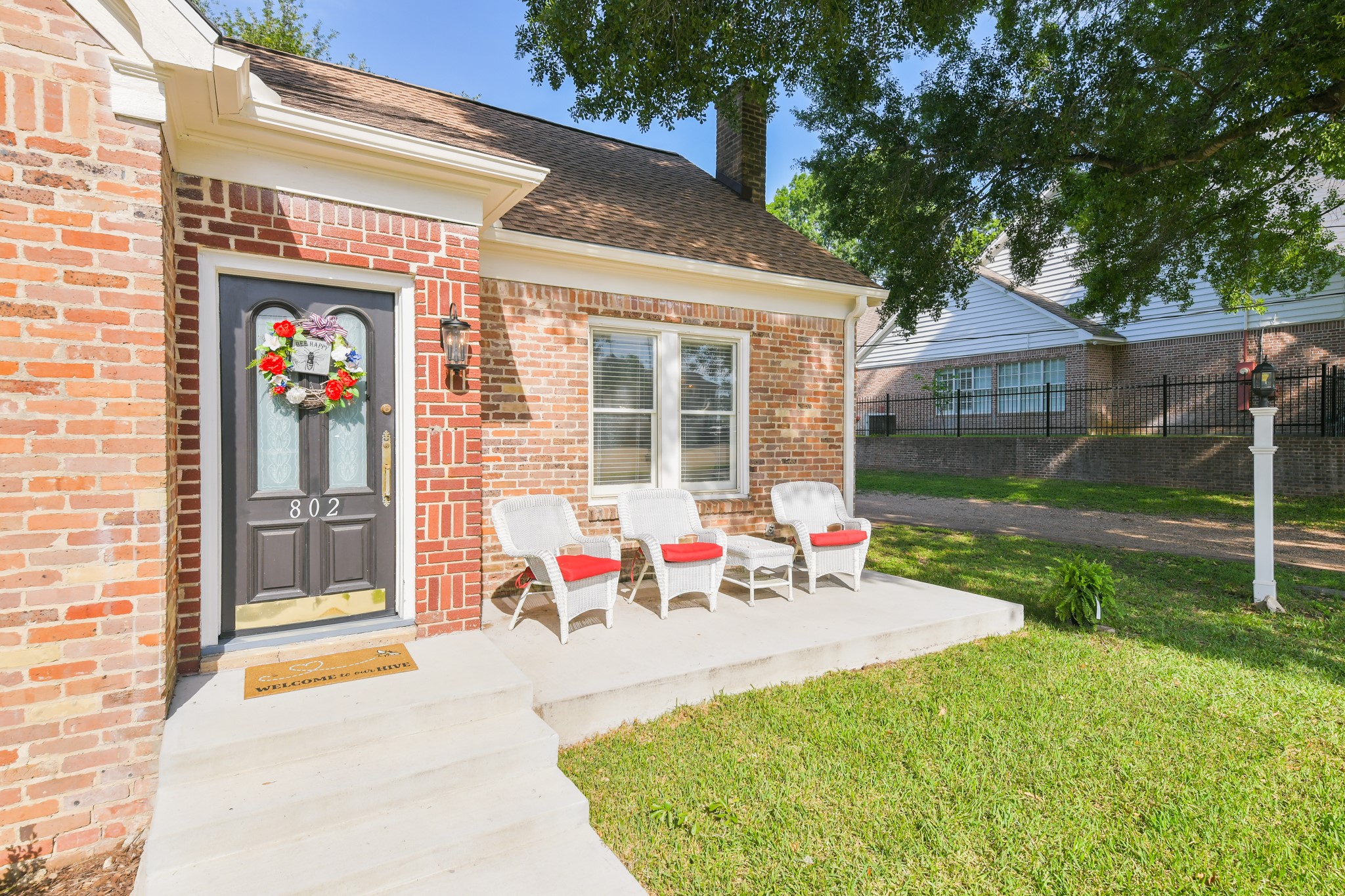 802 South Day Street Brenham, TX 77833 - Photo 5 of 50 a view of a house with backyard porch and sitting area