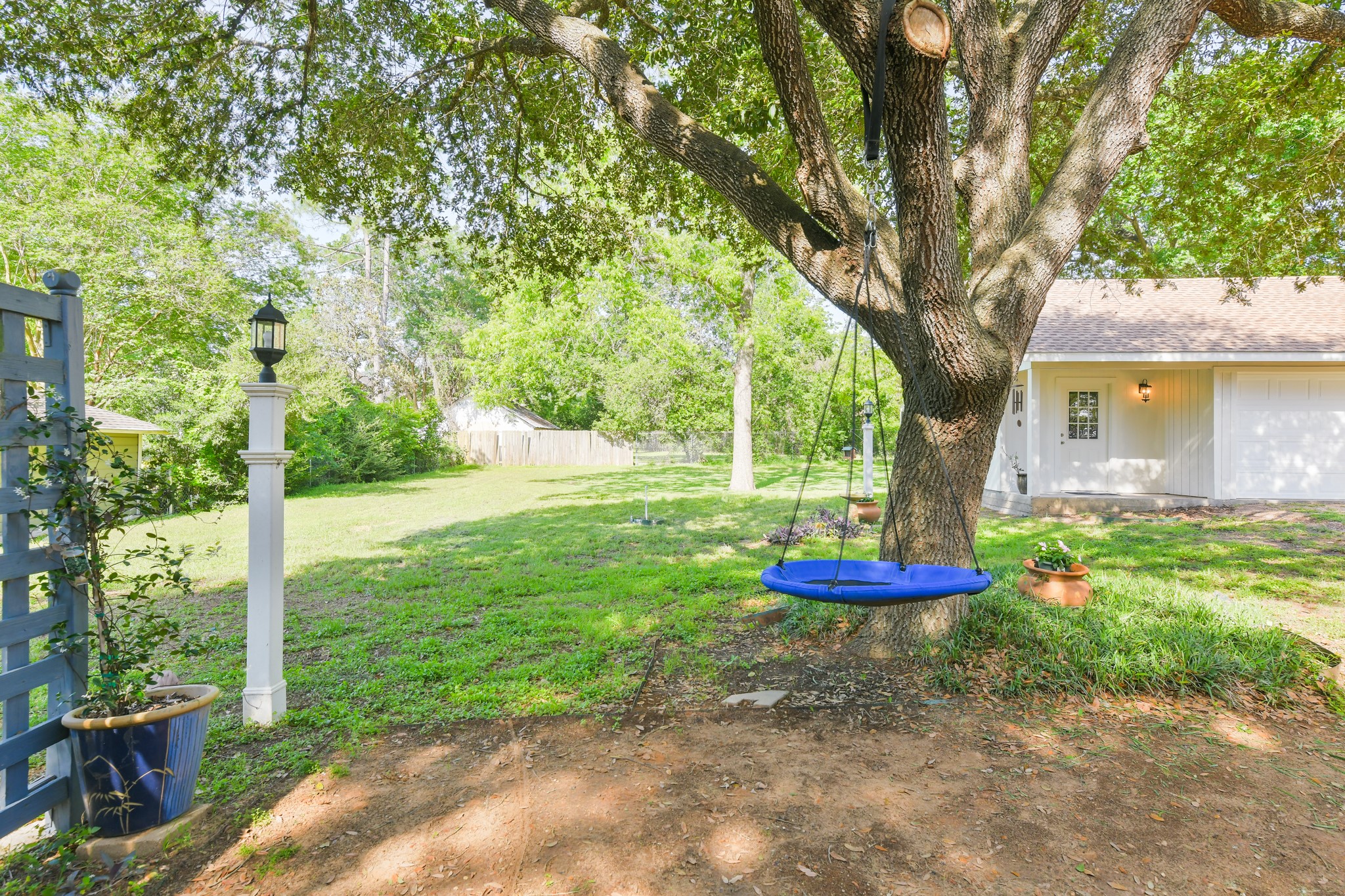 802 South Day Street Brenham, TX 77833 - Photo 10 of 50 a front view of a house with a yard