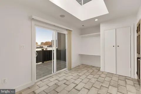 a view of a room with a wardrobe space