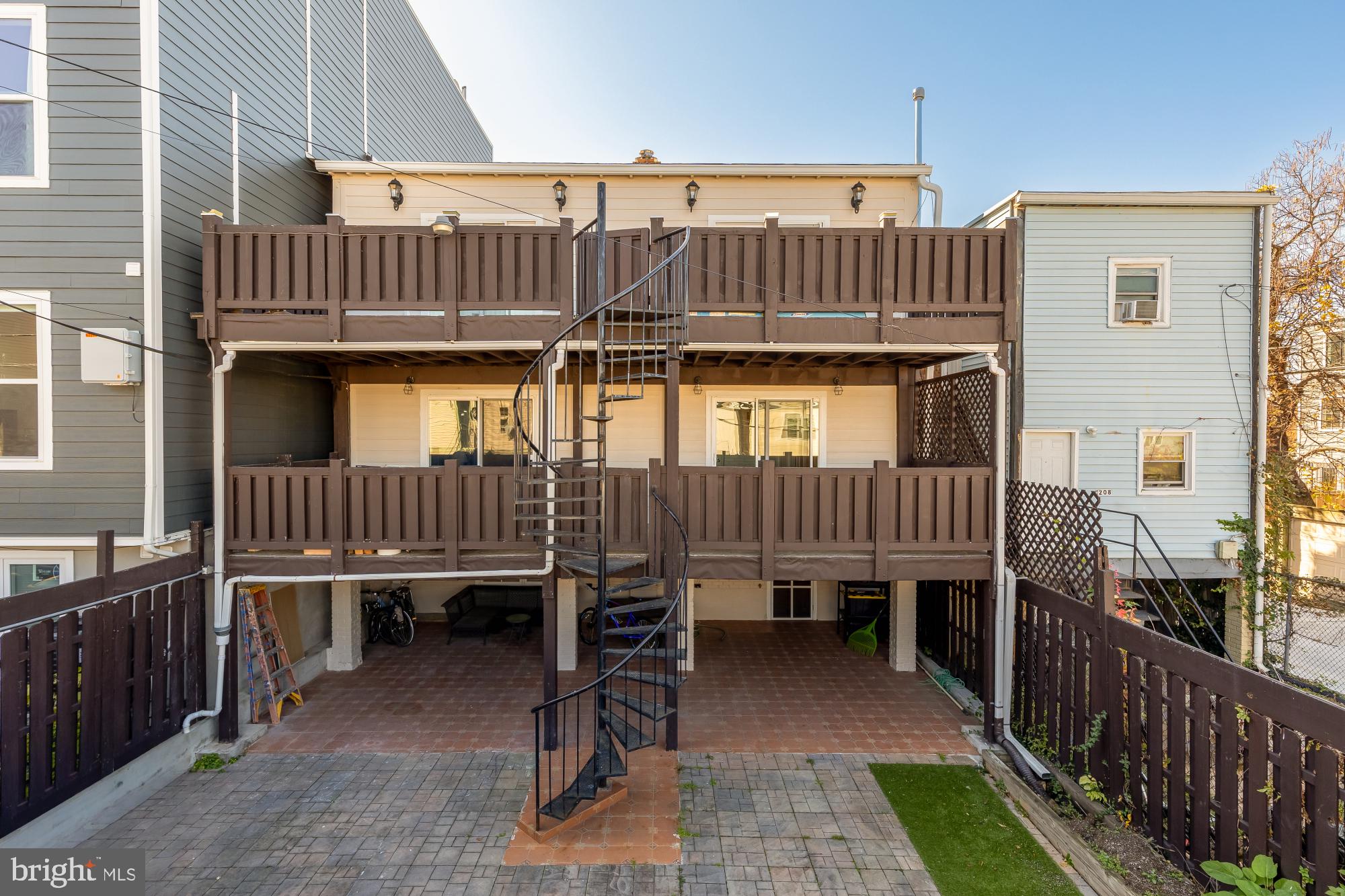 1210 Meigs Place Northeast Washington, DC 20002 - Photo 24 of 41 a view of a deck with barbeque grill wooden floor and fence