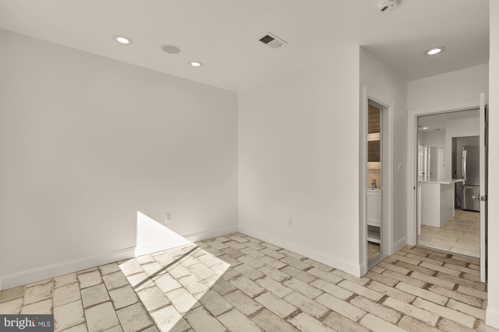 1210 Meigs Place Northeast Washington, DC 20002 - Photo 33 of 41 a view of an empty room and window