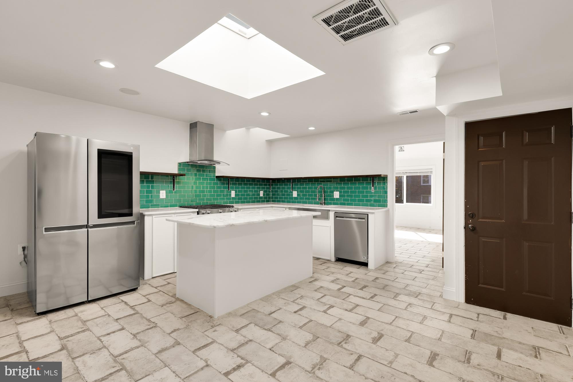 1210 Meigs Place Northeast Washington, DC 20002 - Photo 4 of 41 a view of kitchen with refrigerator and microwave