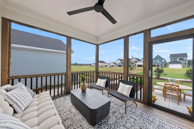 a balcony with furniture and outdoor view