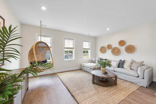 a living room with furniture and window