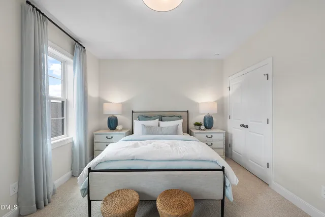 a room with a bed and a window