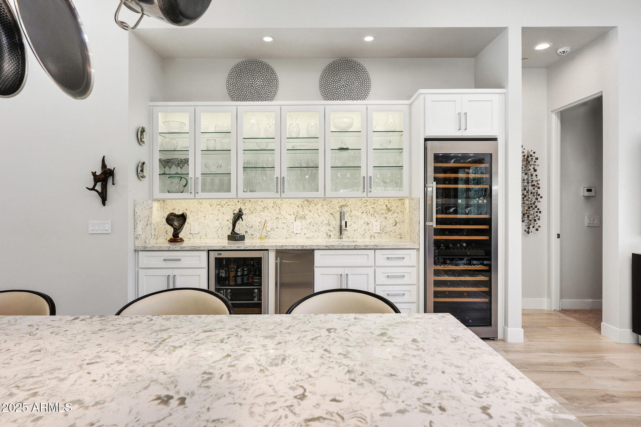 9850 East McDowell Mountain Ranch Road, Unit 1019 Scottsdale, AZ 85260 - Photo 14 of 66 a kitchen with stainless steel appliances kitchen island granite countertop a stove a sink and a refrigerator