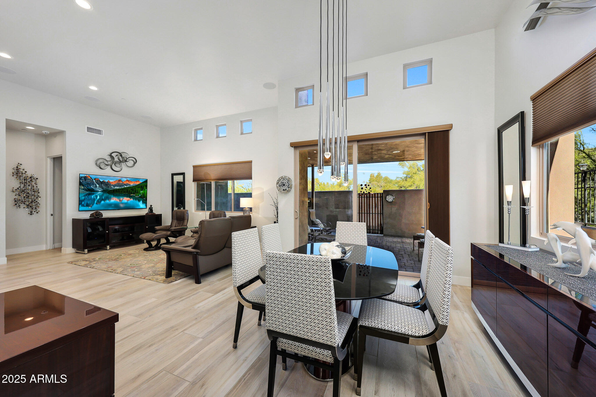 9850 East McDowell Mountain Ranch Road, Unit 1019 Scottsdale, AZ 85260 - Photo 19 of 66 a living room with fireplace furniture and a flat screen tv