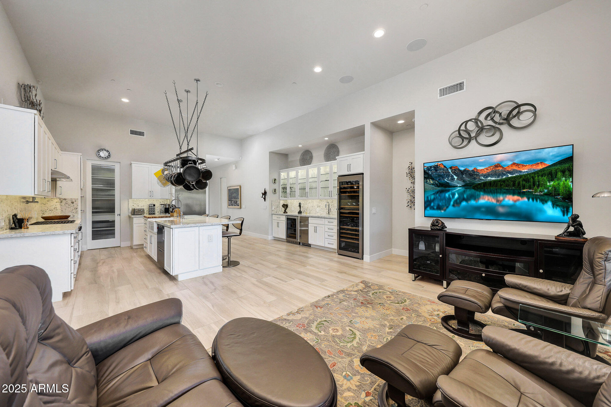9850 East McDowell Mountain Ranch Road, Unit 1019 Scottsdale, AZ 85260 - Photo 20 of 66 a living room with furniture and a flat screen tv