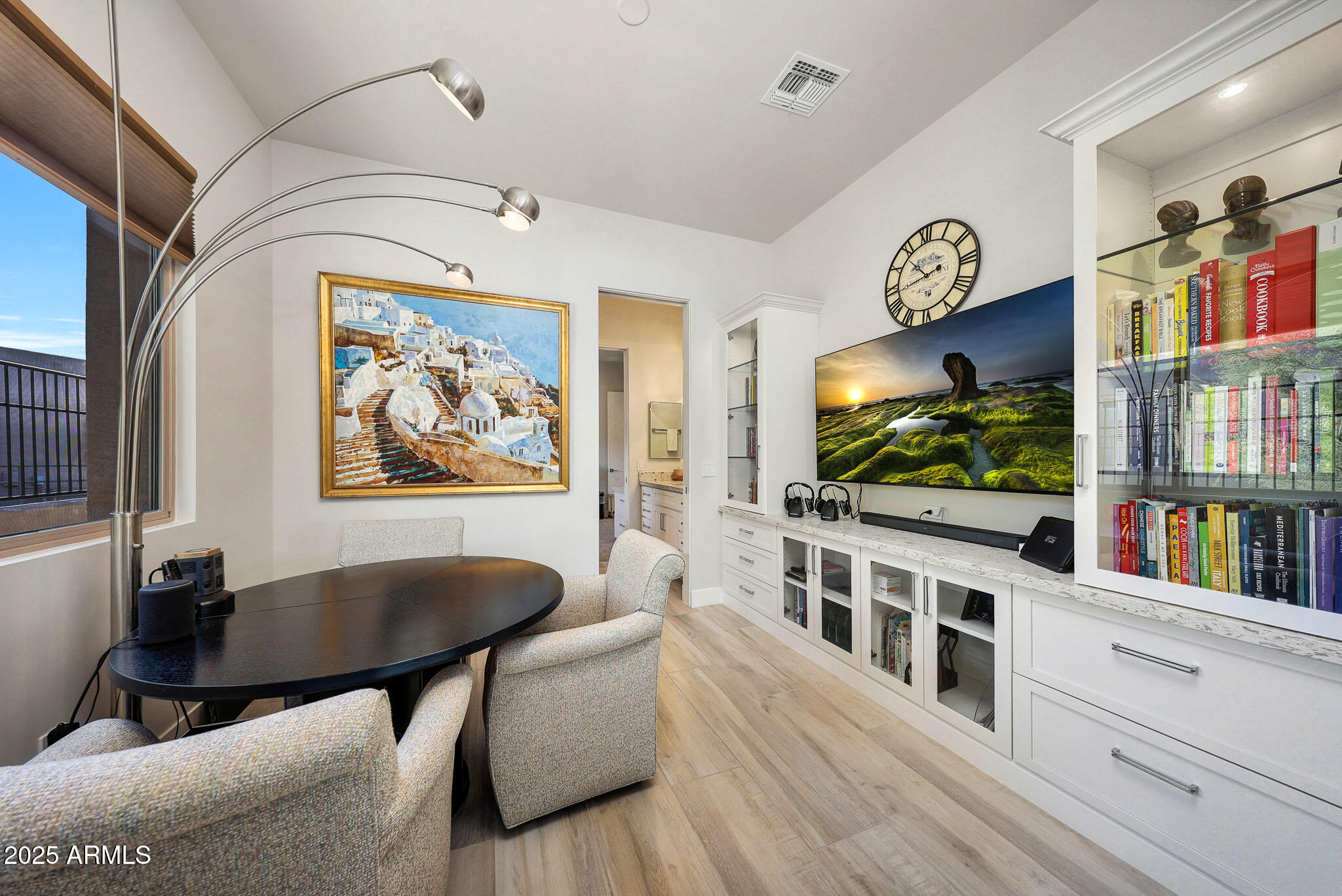 9850 East McDowell Mountain Ranch Road, Unit 1019 Scottsdale, AZ 85260 - Photo 23 of 66 a living room with furniture and a flat screen tv