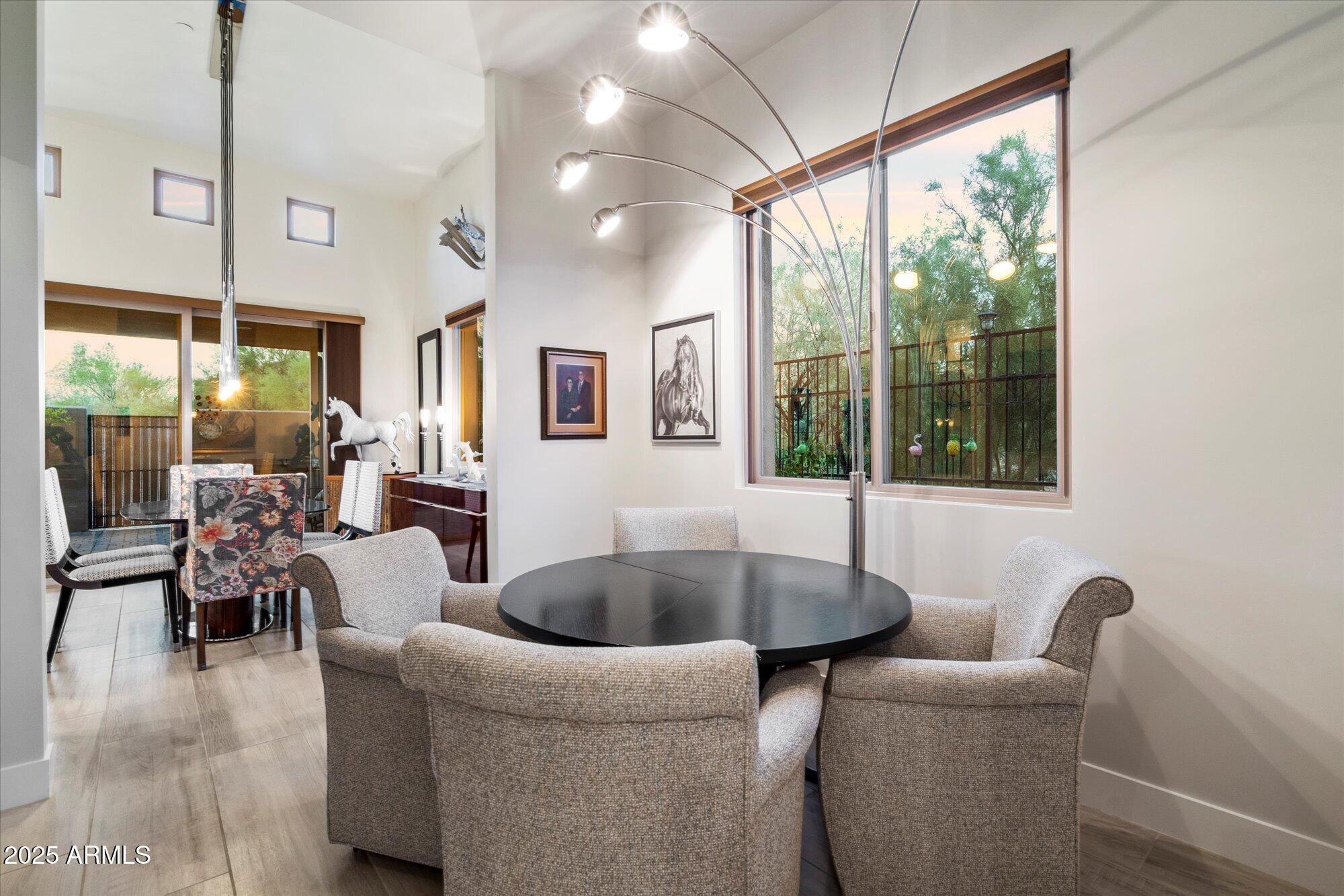 9850 East McDowell Mountain Ranch Road, Unit 1019 Scottsdale, AZ 85260 - Photo 24 of 66 a living room with furniture and a large window