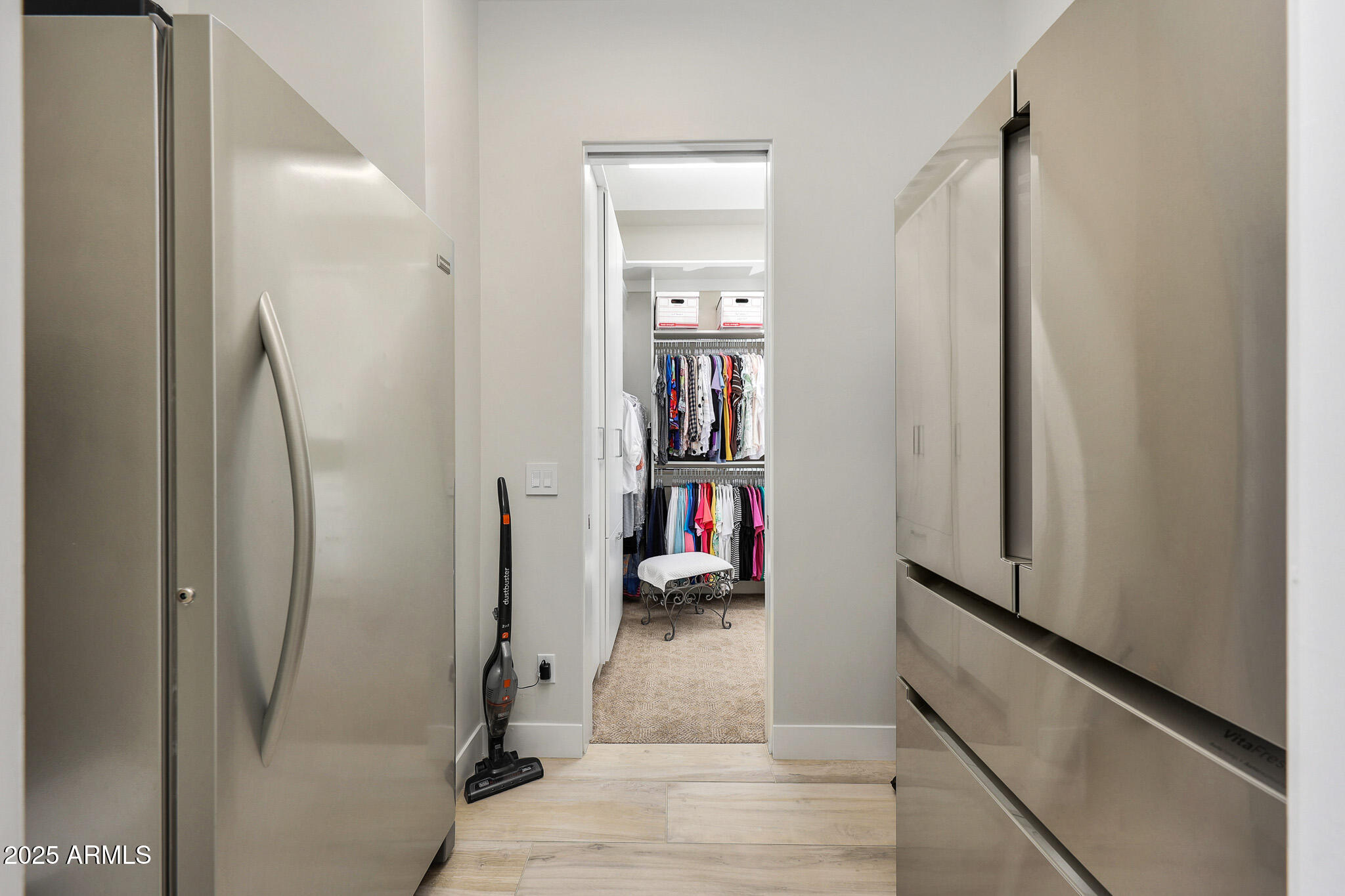9850 East McDowell Mountain Ranch Road, Unit 1019 Scottsdale, AZ 85260 - Photo 38 of 66 a view of a hallway with wooden floor and closet