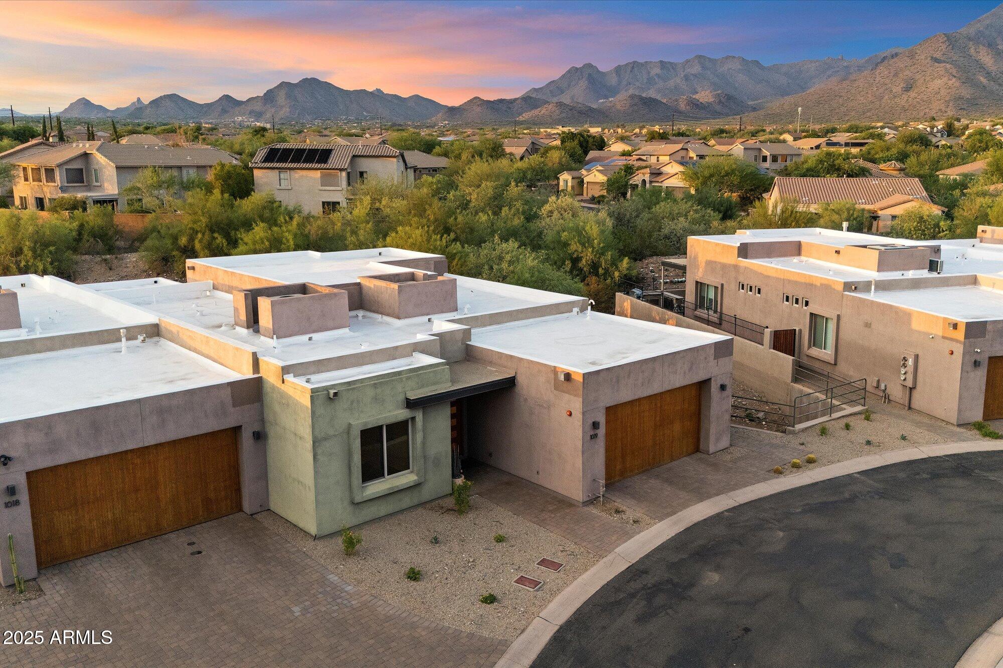 9850 East McDowell Mountain Ranch Road, Unit 1019 Scottsdale, AZ 85260 - Photo 53 of 66 a view of a terrace with a mountain