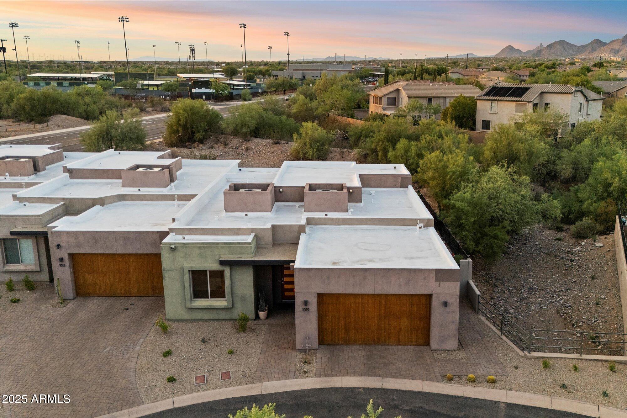 9850 East McDowell Mountain Ranch Road, Unit 1019 Scottsdale, AZ 85260 - Photo 54 of 66 a aerial view of a house with a yard