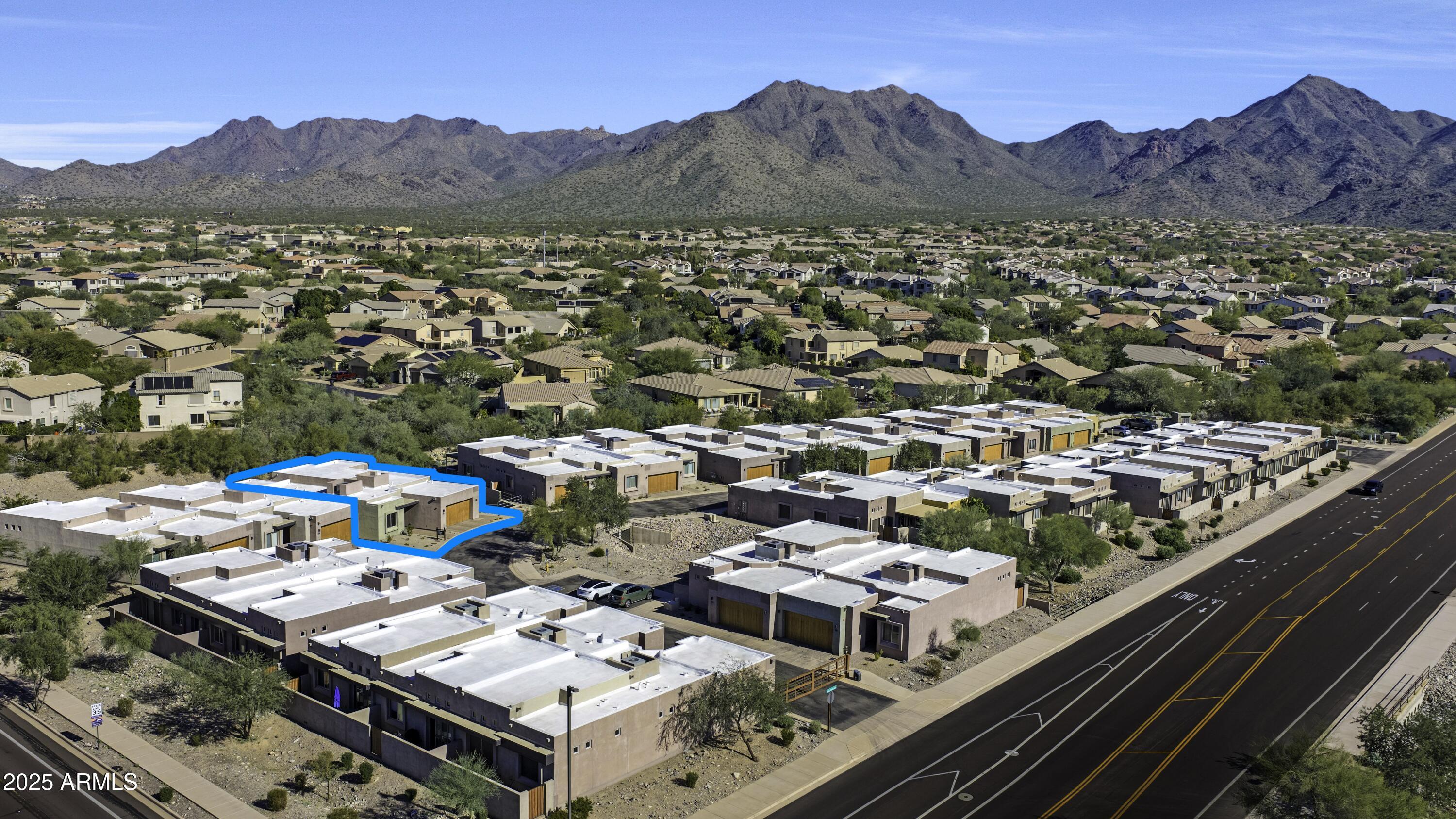 9850 East McDowell Mountain Ranch Road, Unit 1019 Scottsdale, AZ 85260 - Photo 58 of 66 an aerial view of a house with a mountain view