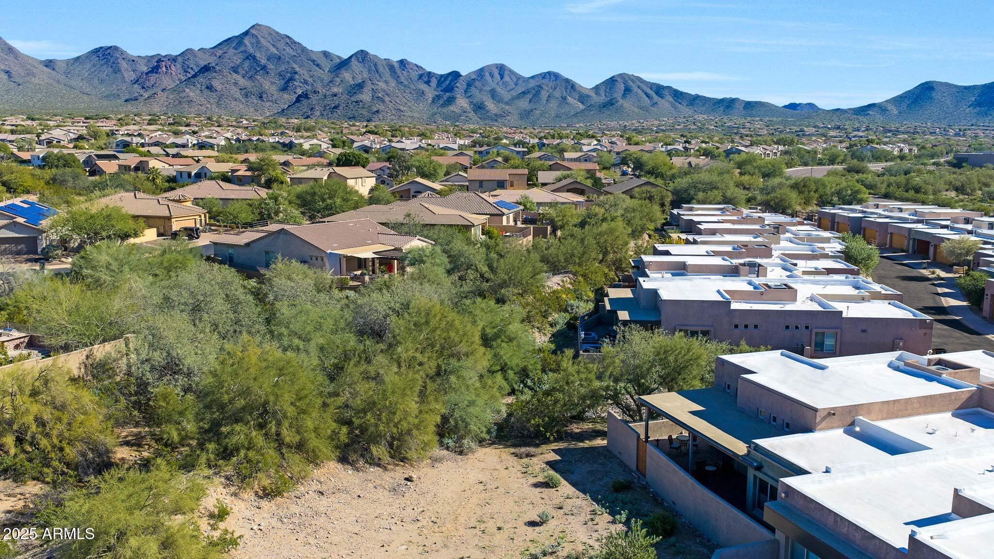 9850 East McDowell Mountain Ranch Road, Unit 1019 Scottsdale, AZ 85260 - Photo 63 of 66 an aerial view of residential house with outdoor space and mountain view