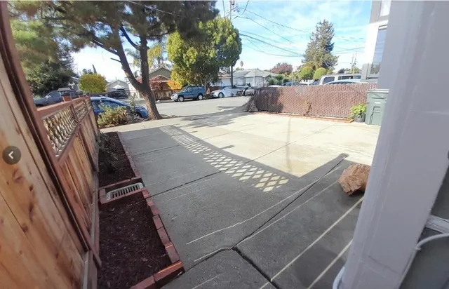 a view of swimming pool from a balcony