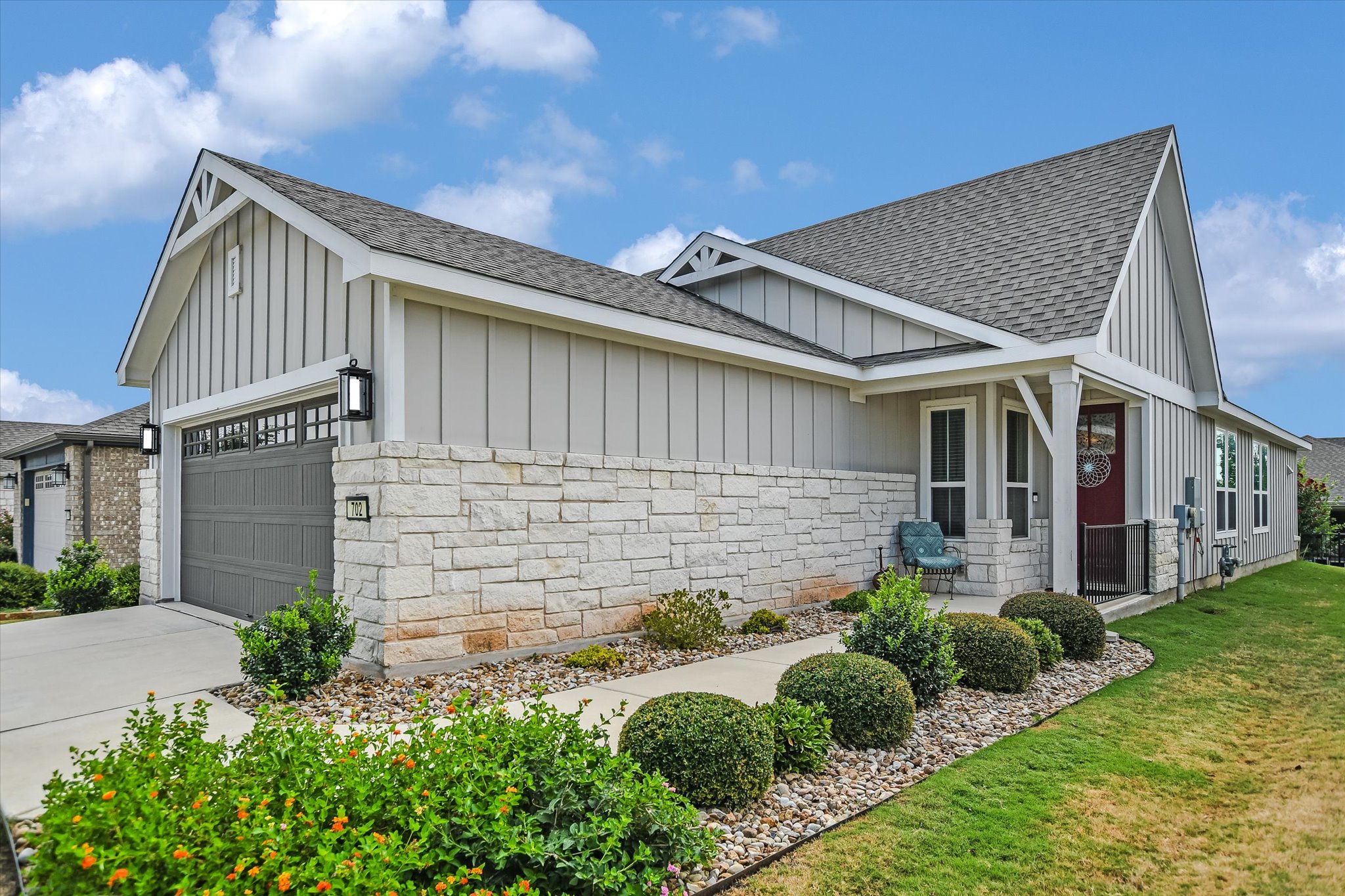 702 Kitty Hawk Road Georgetown, TX 78633 - Photo 2 of 20 a front view of a house with garden