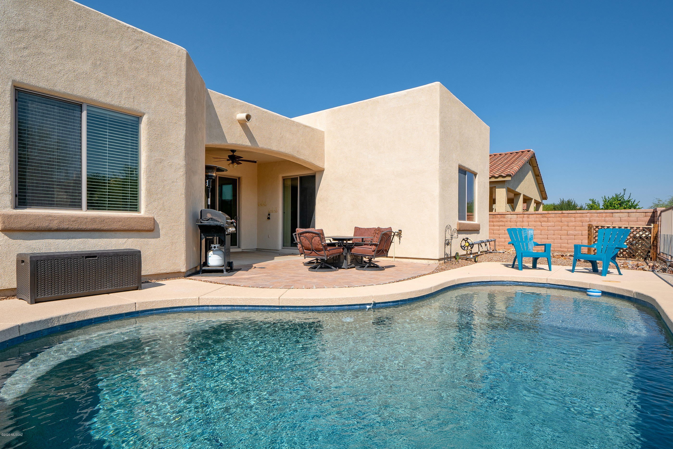 4440 West Crystal Ranch Place Marana, AZ 85658 - Photo 6 of 28 a view of a house with a swimming pool