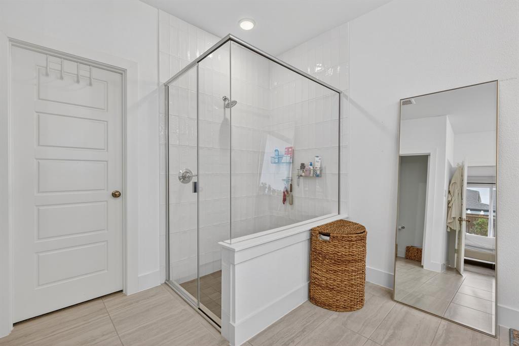 7117 Mantle Ridge Drive Fort Worth, TX 76179 - Photo 21 of 38 a bathroom with a shower and a sink