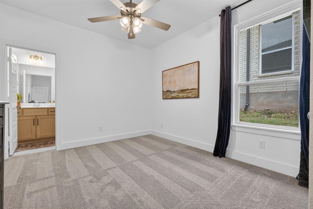 7117 Mantle Ridge Drive Fort Worth, TX 76179 - Photo 24 of 38 an empty room with windows and closet