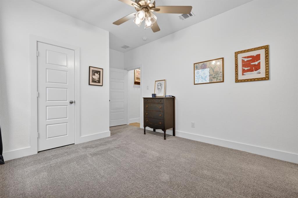 7117 Mantle Ridge Drive Fort Worth, TX 76179 - Photo 25 of 38 a view of room with hardwood floor and workspace