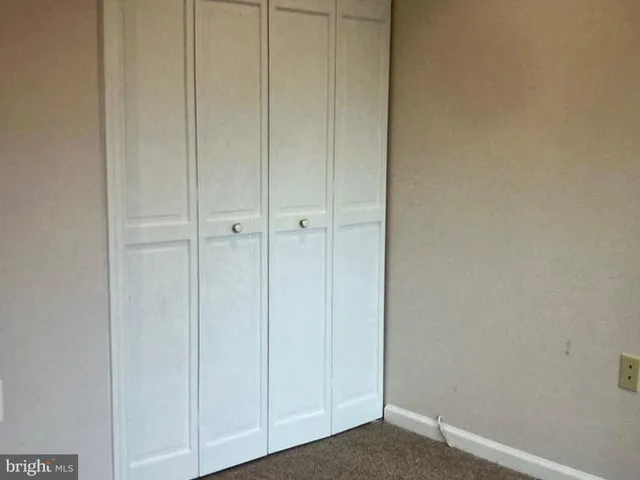 a bathroom with a tub sink and vanity