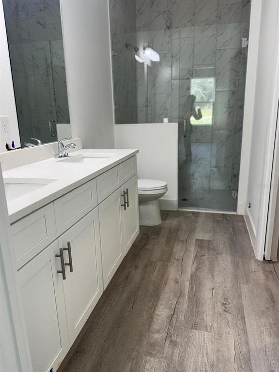 9187 North Travis Drive, Unit 9189 Citrus Springs, FL 34434 - Photo 15 of 21 a bathroom with a sink and mirror