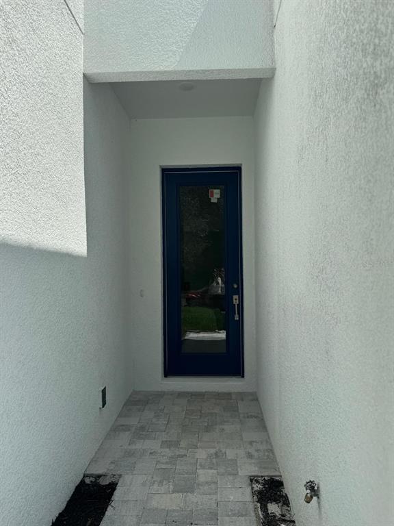 9187 North Travis Drive, Unit 9189 Citrus Springs, FL 34434 - Photo 3 of 21 a view of an empty room with a window