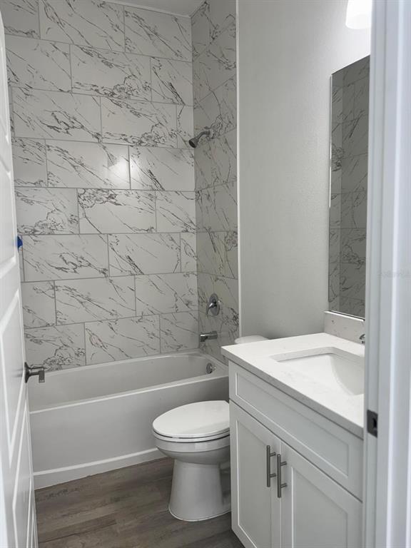 9187 North Travis Drive, Unit 9189 Citrus Springs, FL 34434 - Photo 7 of 21 a bathroom with a sink a toilet and bathtub