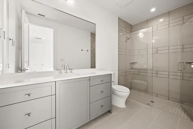 a bathroom with a sink a toilet and bathtub