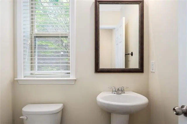 a bathroom with a sink and a toilet