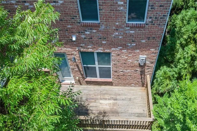 a brick building with a yard