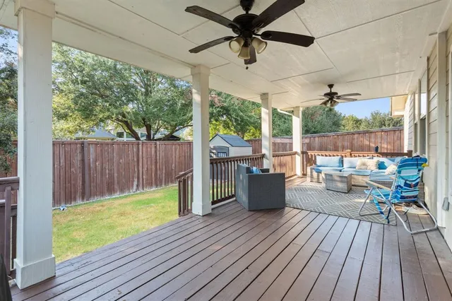 a view of a deck with wooden floor and outdoor space