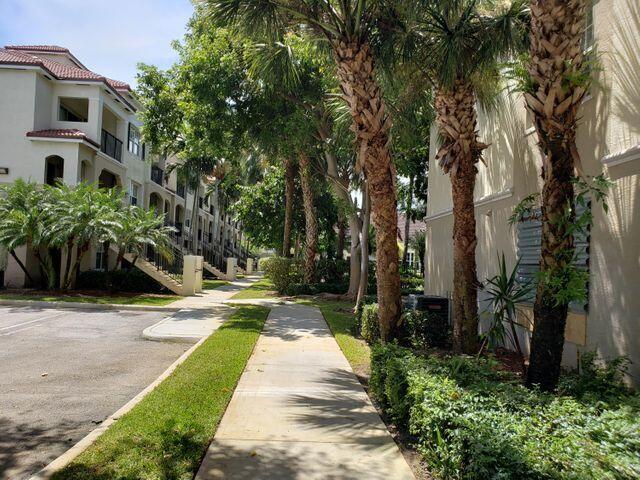 5900 West Sample Road, Unit 304 Coral Springs, FL 33067 - Photo 2 of 18 walk way