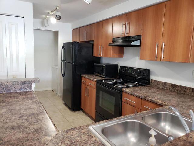 5900 West Sample Road, Unit 304 Coral Springs, FL 33067 - Photo 5 of 18 Kitchen