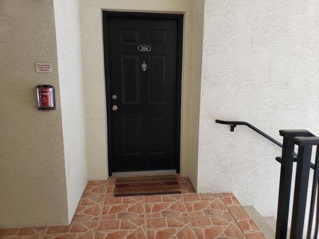 5900 West Sample Road, Unit 304 Coral Springs, FL 33067 - Photo 10 of 18 Front entrance