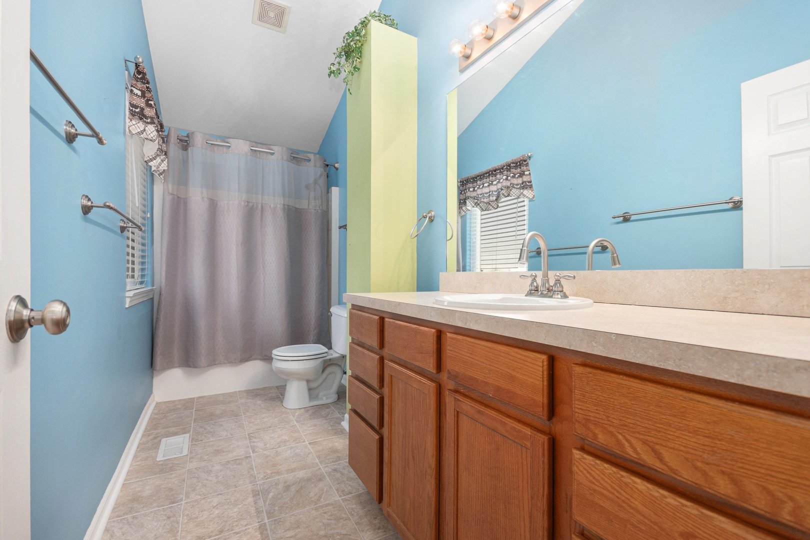 1616 Stanton Lane Plainfield, IL 60586 - Photo 14 of 40 a bathroom with a granite countertop sink toilet and shower