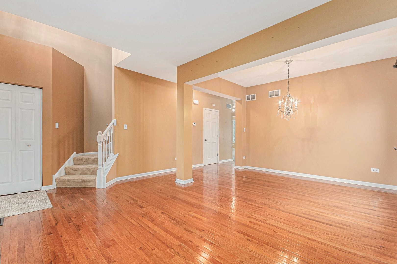 1616 Stanton Lane Plainfield, IL 60586 - Photo 3 of 40 a view of empty room with wooden floor