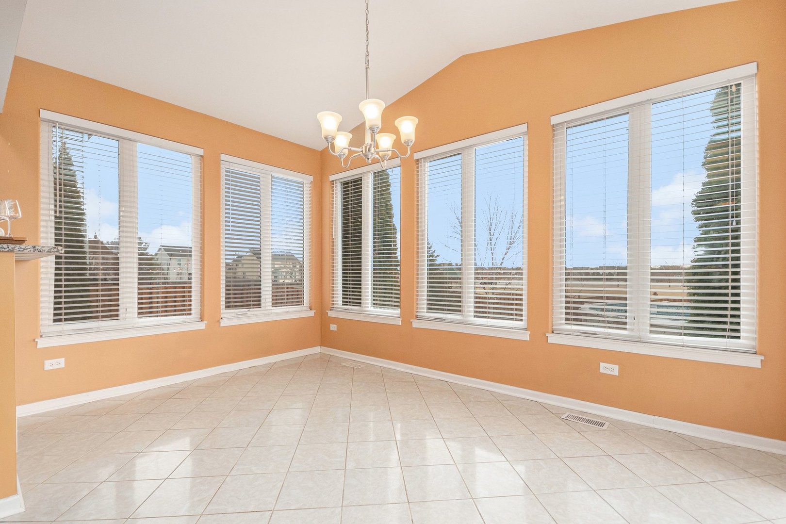 1616 Stanton Lane Plainfield, IL 60586 - Photo 9 of 40 a view of an empty room with a window